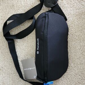 NWT Therabody x United Black Sling Bag Amenity Kit